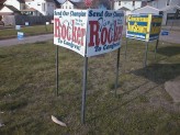 Rooker/Schmitt signs - steel poles
